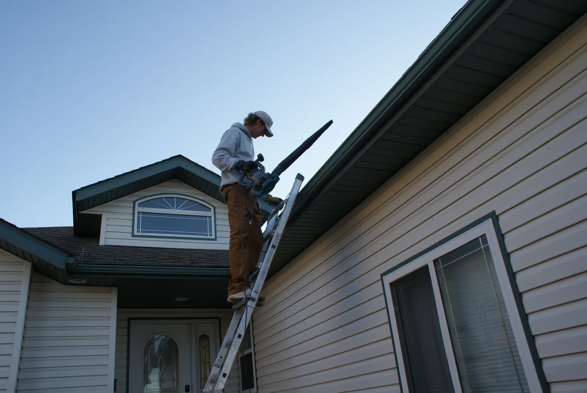 Professional soft washing service protecting home exterior